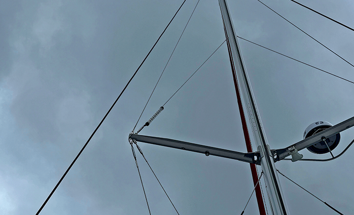 Tube-style reflector on a sail string during a cloudy and overcast day.